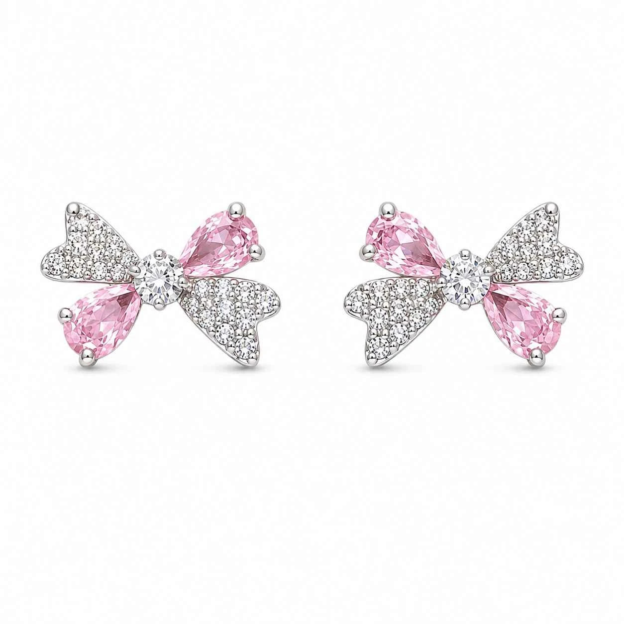 Pink and silver ribbon bow stud earrings with pink teardrop stones and sparkle