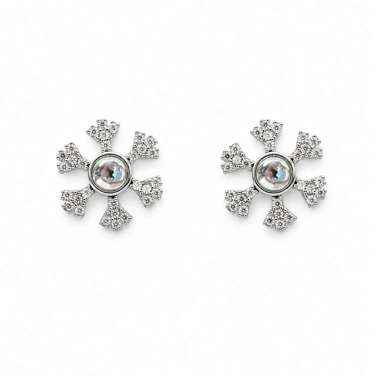 Pair of silver snowflake stud earrings with round center and sparkling pave stones