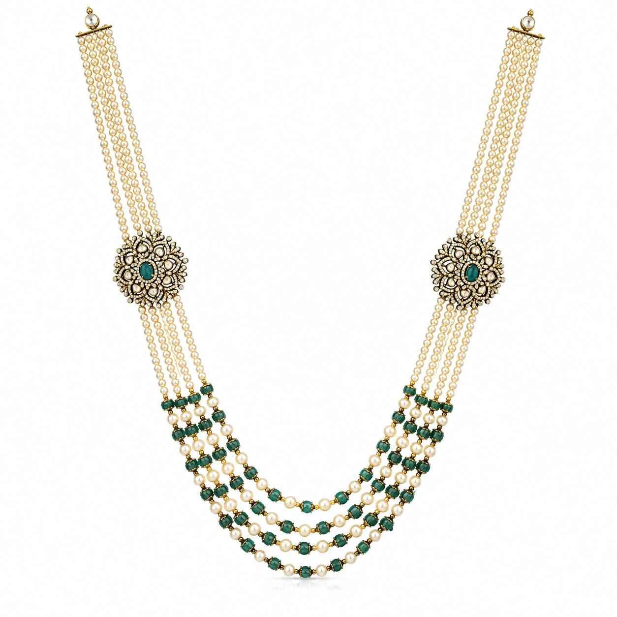 Layered pearl necklace with round green center pendant and multi-row chain drape