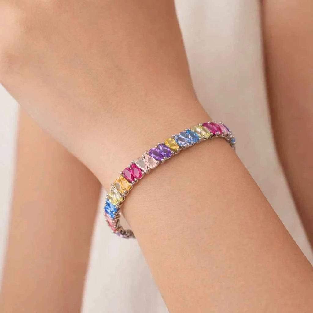 Rainbow pear-cut stone bracelet with multicolor sparkle on silver band, clasp