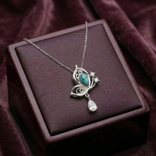 Delicate Turquoise Butterfly Charm Necklace in Silver