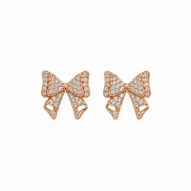 Rose gold bow stud earrings with sparkling crystal pavé in a butterfly bow shape.