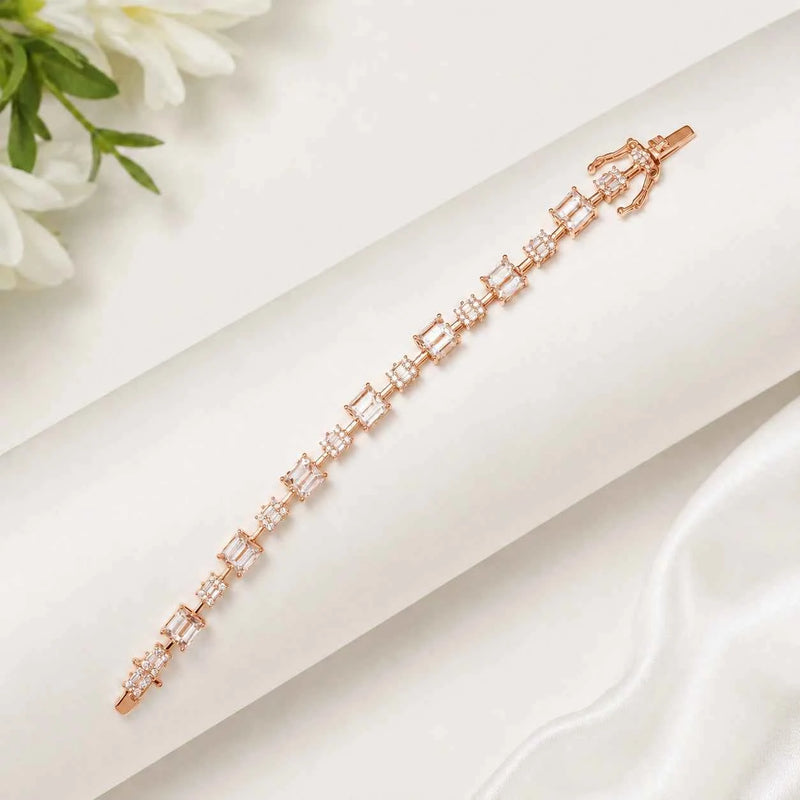 Rose gold tennis bracelet with square-cut crystal stones and hinged clasp