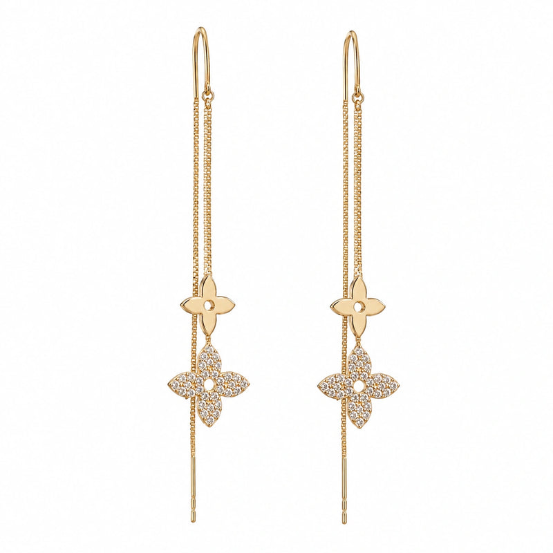 Gold-tone floral tassel earrings, pair view, four-petal clover charms on chains