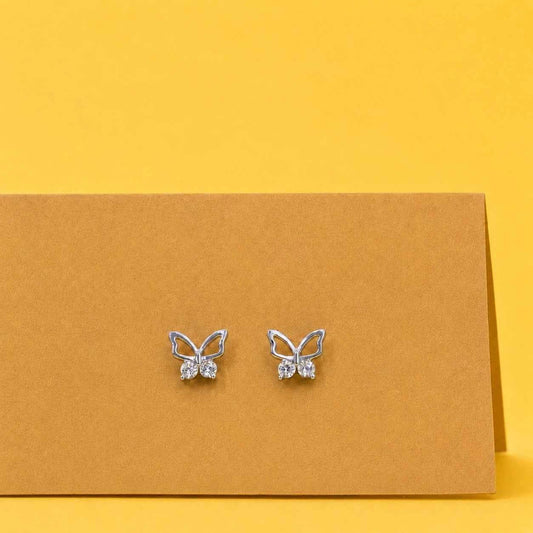 Butterfly stud earrings with crystal stones on a jewelry card, silver-tone