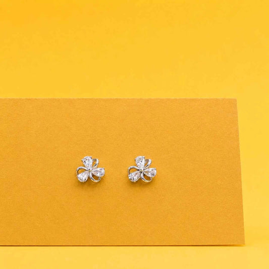 Clover-shaped silver stud earrings with five clear stones, shown as a pair
