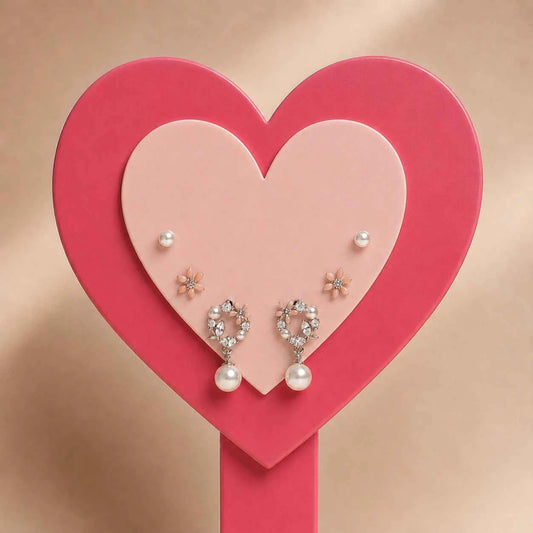 Floral and pearl wreath charm with heart-shaped posts and pearl dangle accents