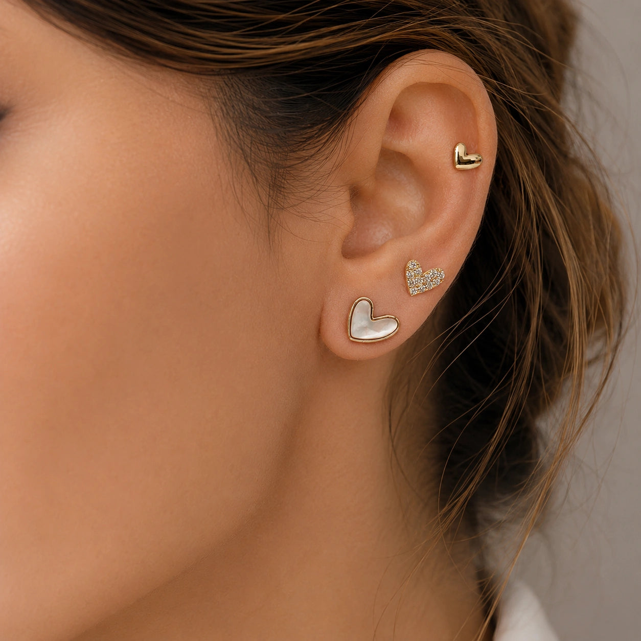 Gold Heart Side Earring Collection