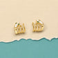 Golden Serpent Coil Huggie Earrings