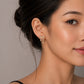 Golden Ribbon Sparkle Drop Stud Earrings