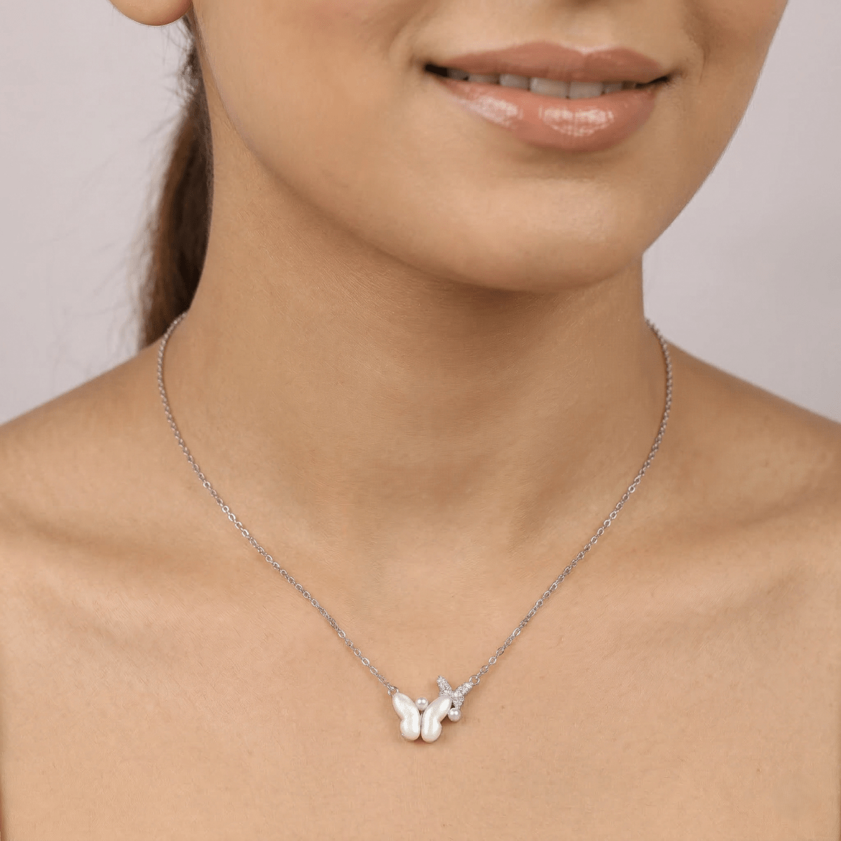 Asymmetrical Mother - of - Pearl & Sparkling Zirconia Dual Butterfly Necklace - Silvorn India