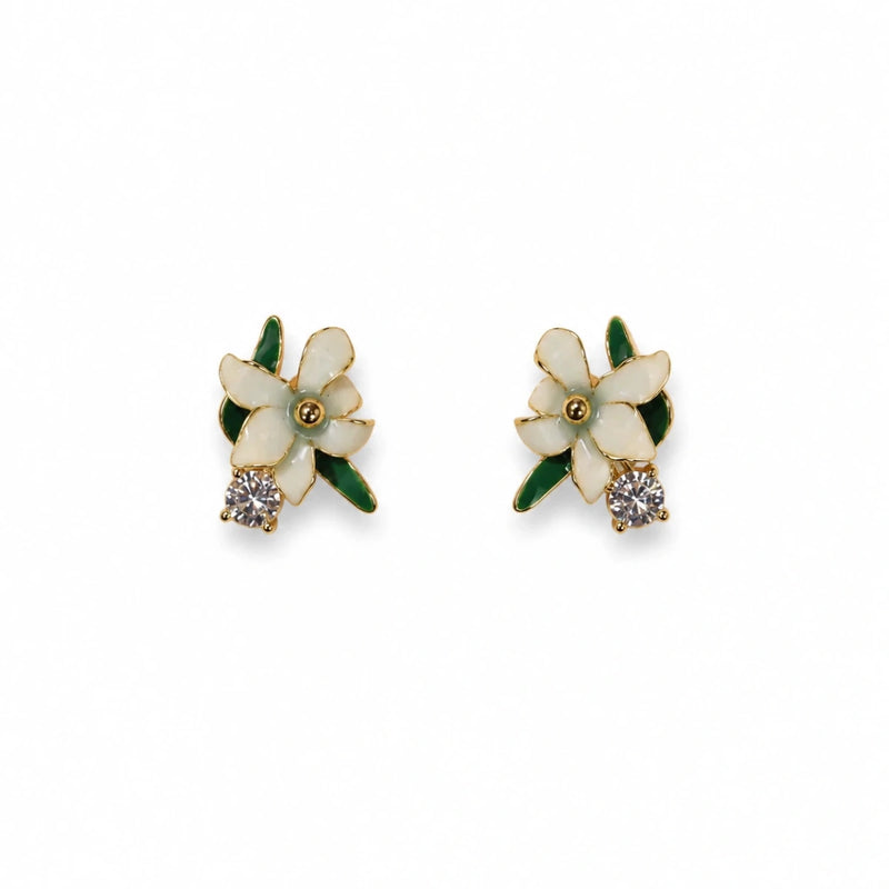 Pair of silver flower stud earrings with green enamel petals and clear crystals