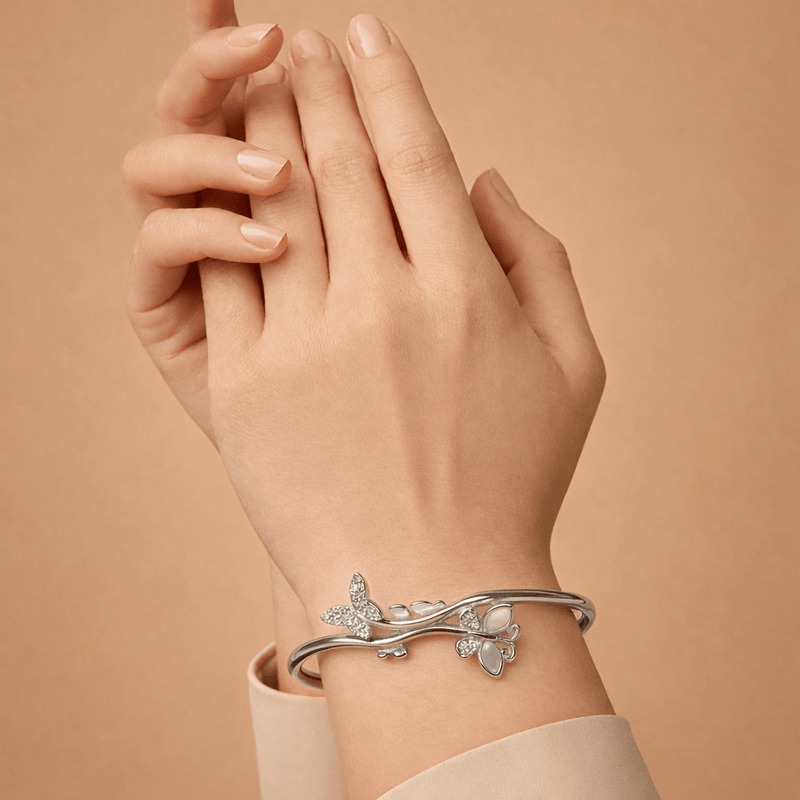 925 silver butterfly floral vine cuff bracelet worn on forearm