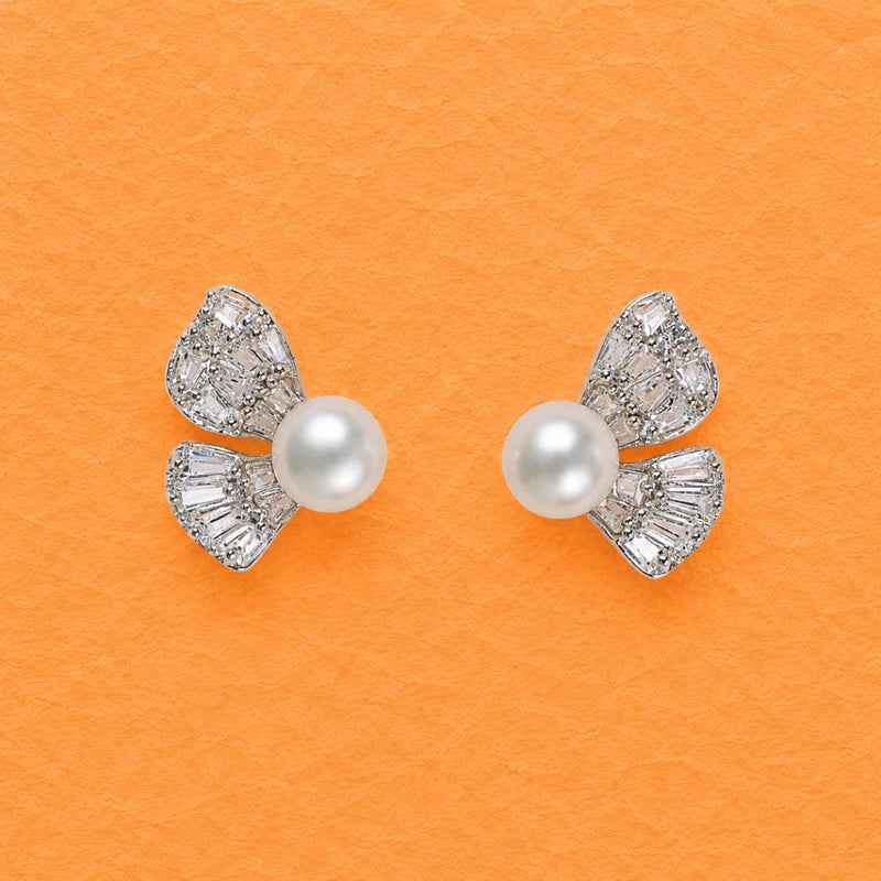 Butterfly stud earrings with white pearl center and silver crystal wing accents