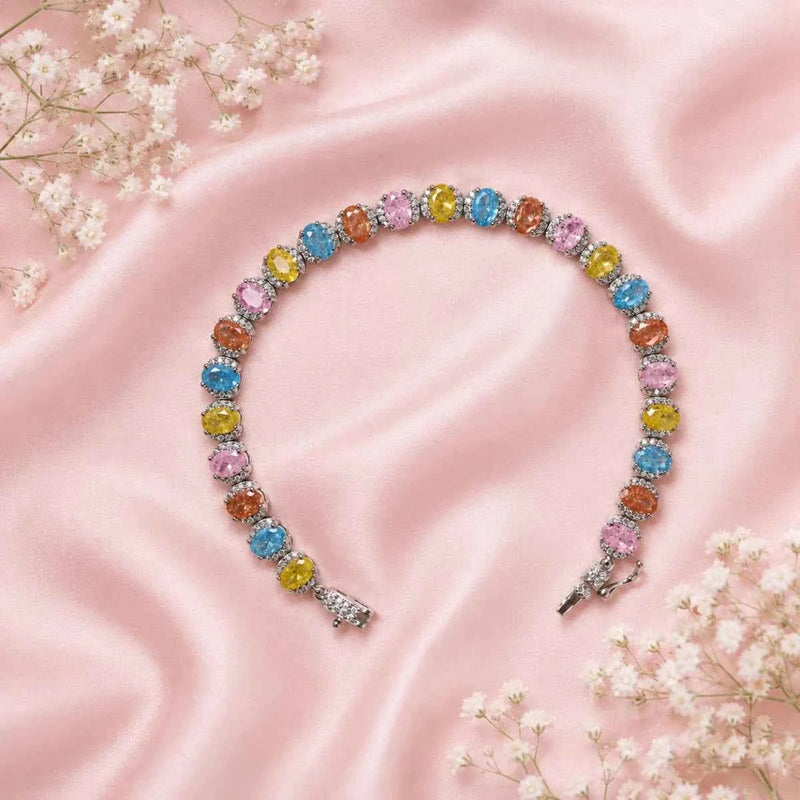 Pastel tennis bracelet with round multicolor gemstones and silver-toned end charms