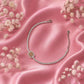 925 silver tennis bracelet with pavé links and warm-toned square center stone