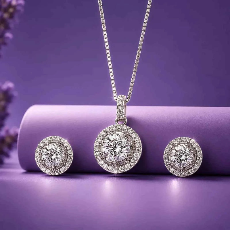 925 silver circular halo pendant with two matching round halo stud earrings on display