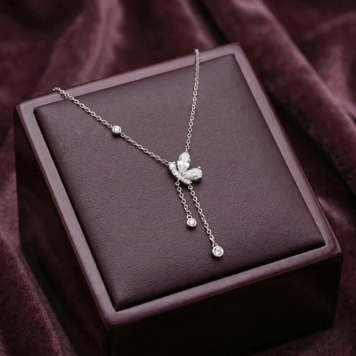 Elegant Butterfly Drop Pendant Necklace with Dangling Crystals - Silvorn India