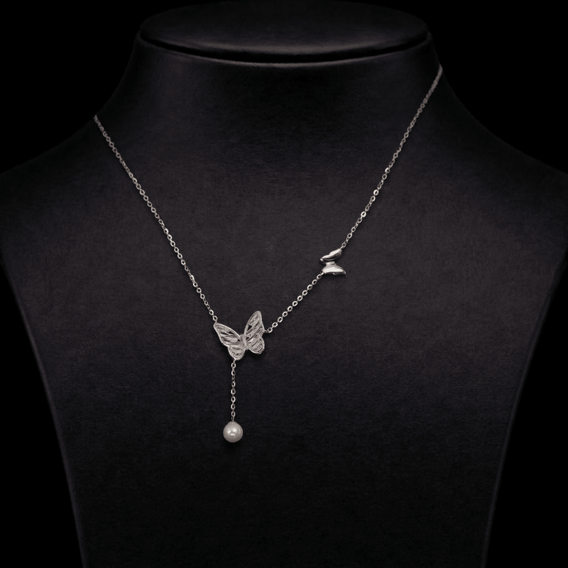 925 silver butterfly pendant necklace with dangling pearl on chain.