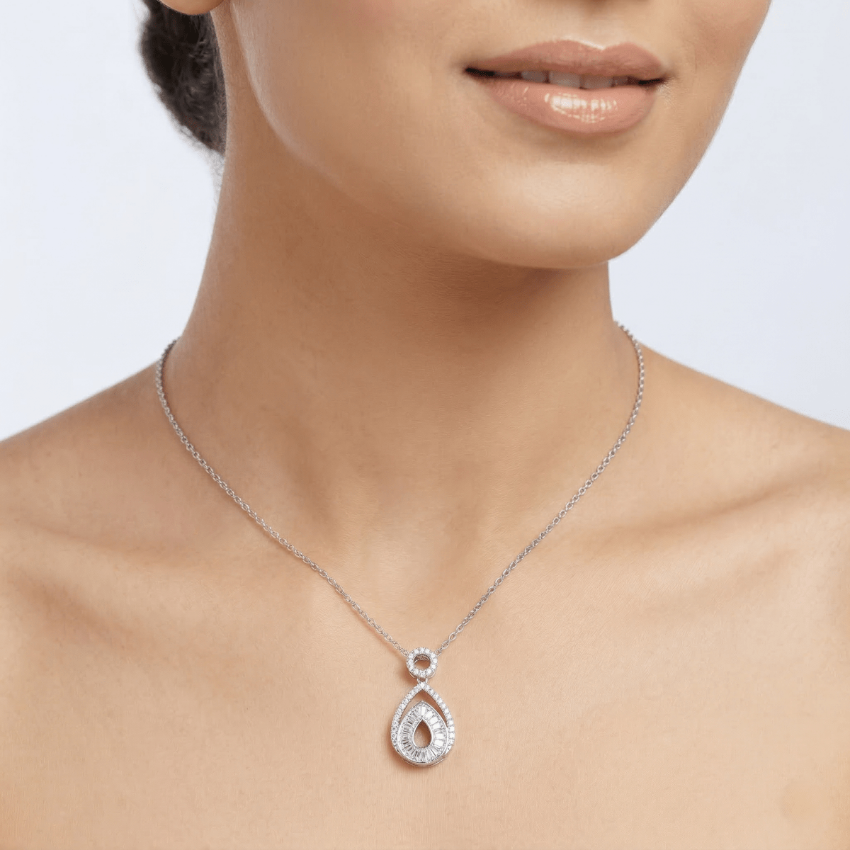 Elegant Teardrop Halo Diamond Pendant Necklace in White Finish - Silvorn India