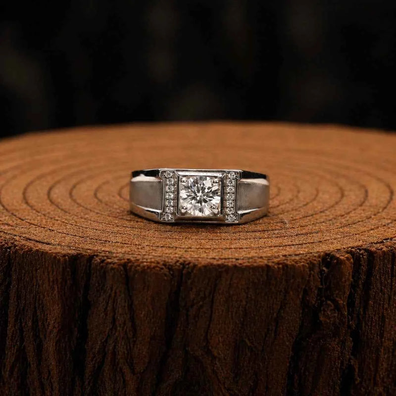 Sterling silver ring with square-cut center stone and side channel accents