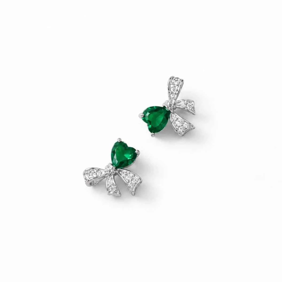 Emerald green gemstone bow charm stud earrings with silver 925 ribbon bows.