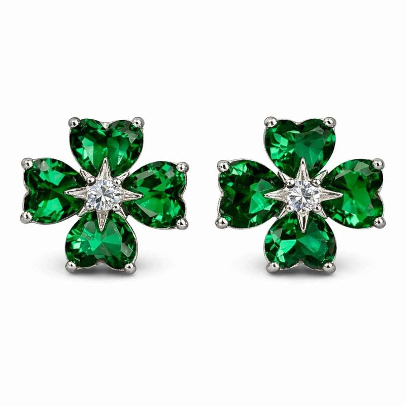 Green clover-shaped stud earrings with central sparkle in silver setting