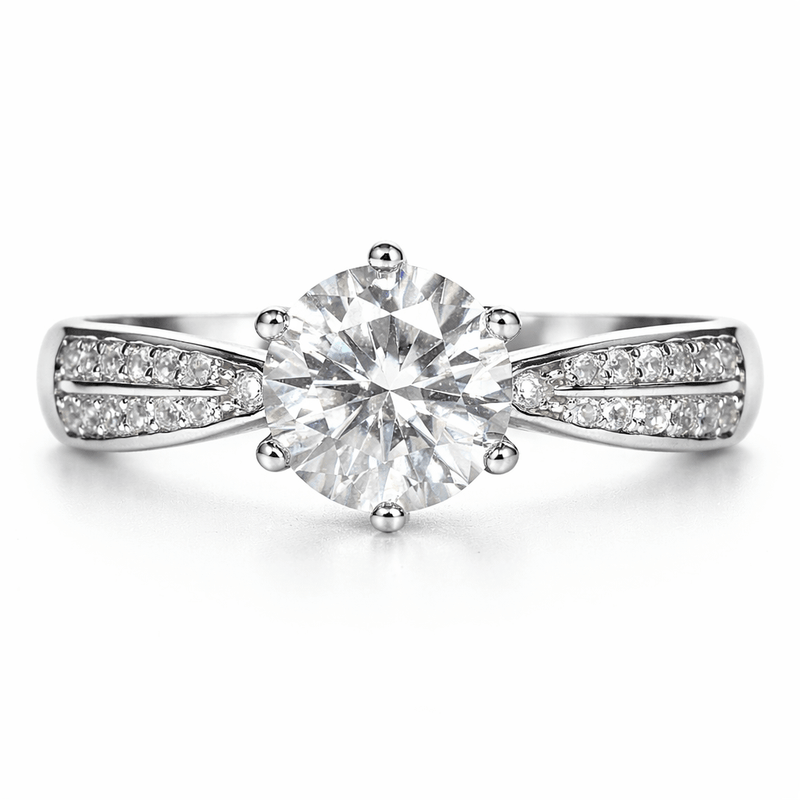 Solitaire twist ring with round center stone and pave band, sterling-silver tone