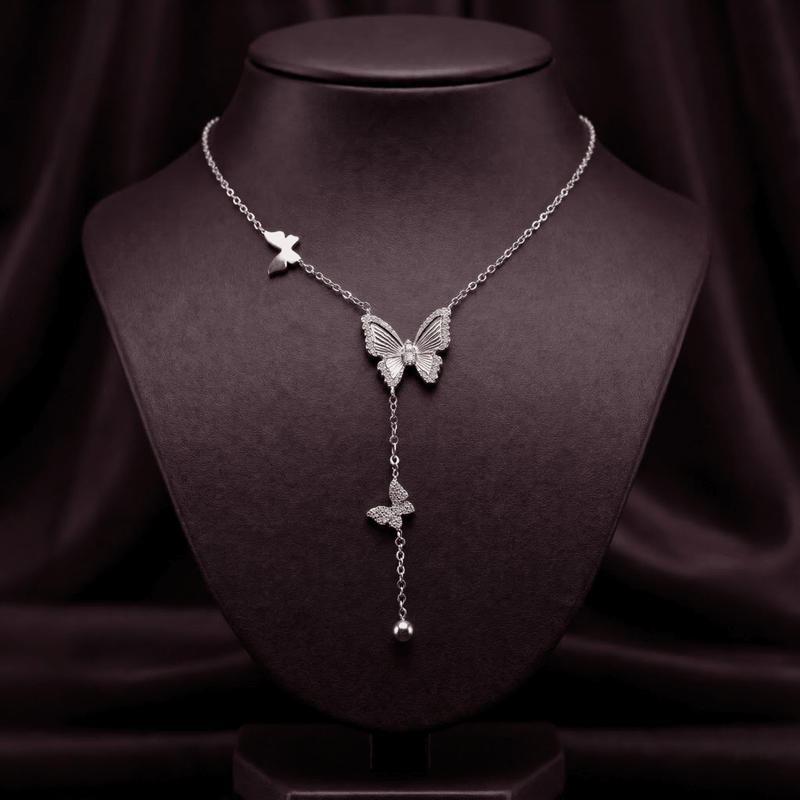Silver Y-necklace with two butterflies and dangling star charm