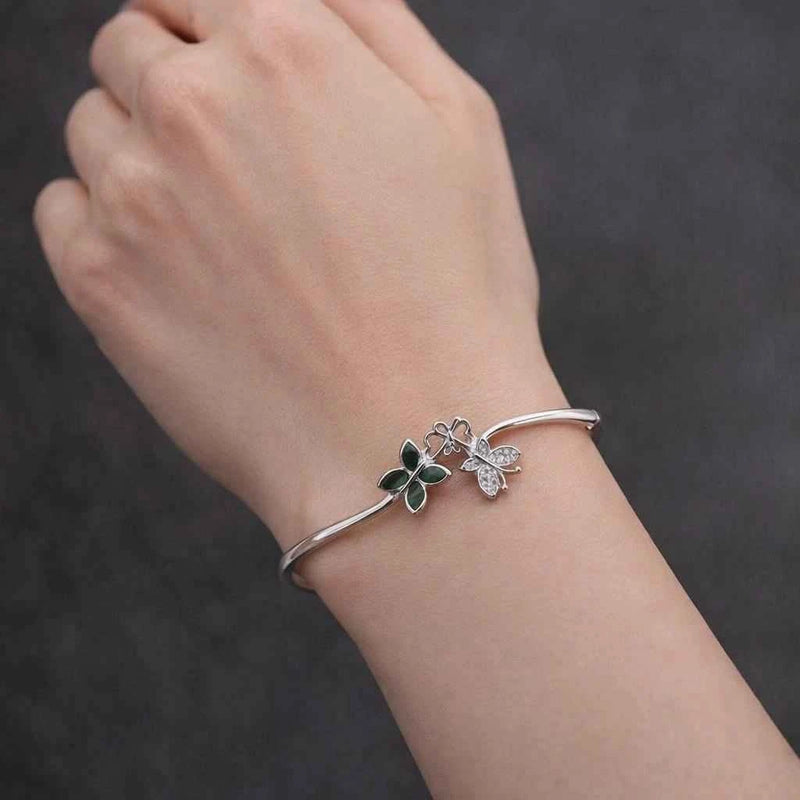 925 silver cuff bracelet with butterfly and clover charms, green enamel accents