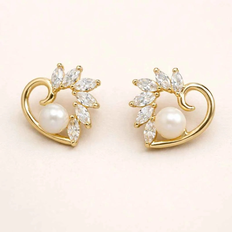 Gold-tone heart stud earrings with white pearl and marquise zirconia accents