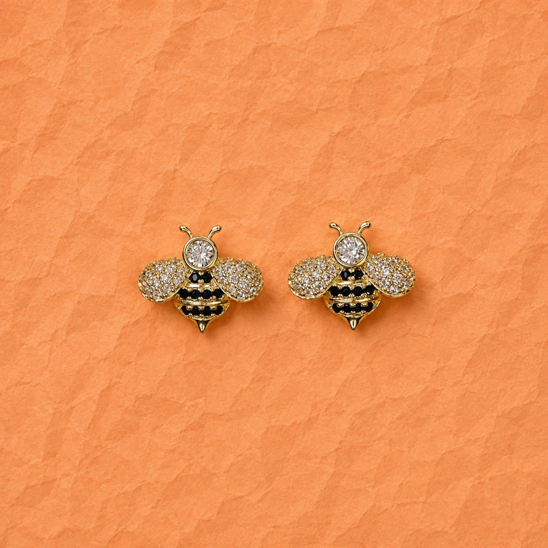 Pair of honey bee zirconia stud earrings, glittering round stones in gold tone