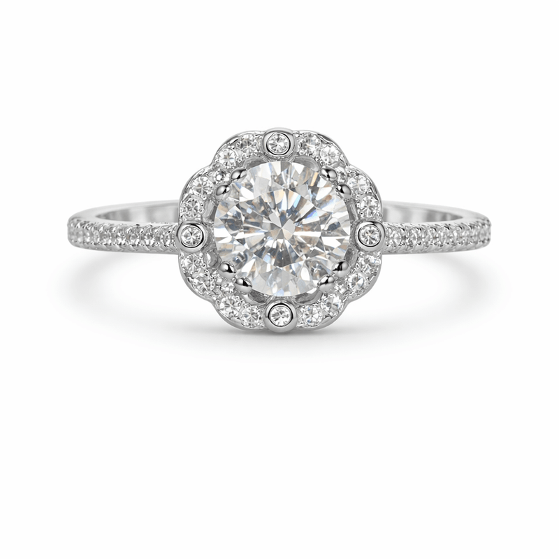 Silver halo ring with round center stone surrounded by small diamonds