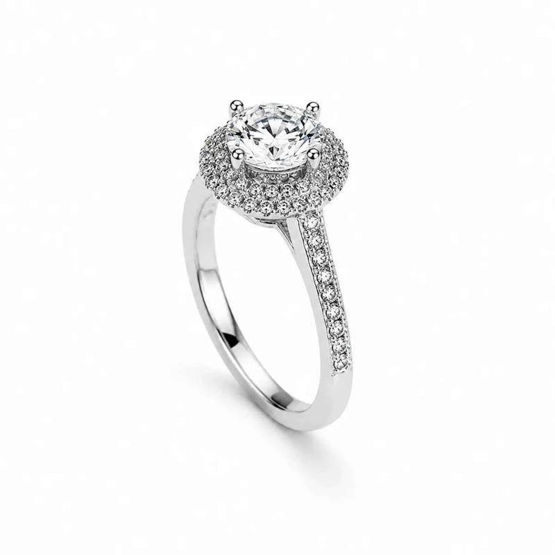 Sterling silver ring with round center stone and pavé halo, slender pavé band