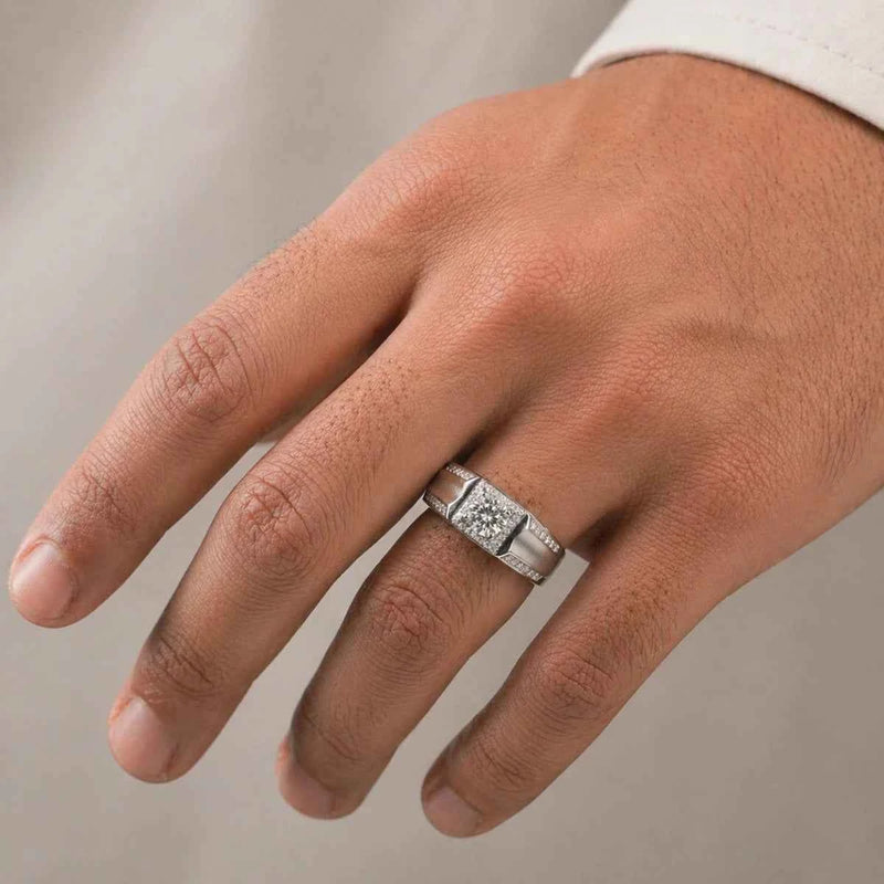 Sterling silver halo ring on hand, wide band with pavé rows and round center stone