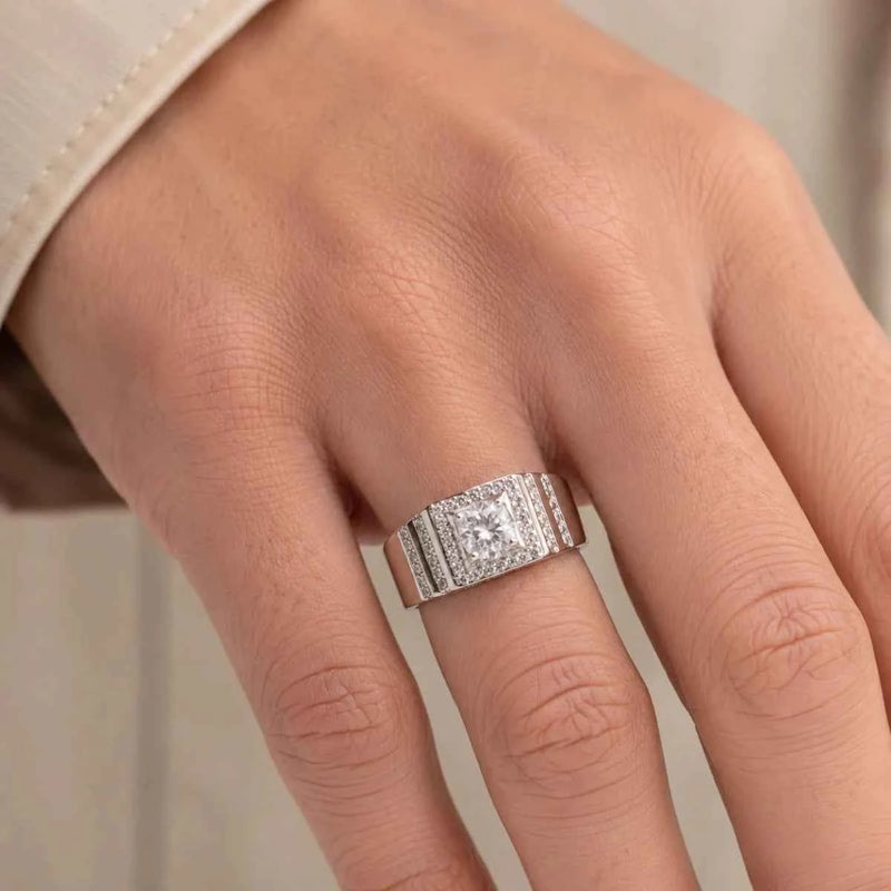 Sterling silver square halo ring on hand, pavé side panels and central round stone