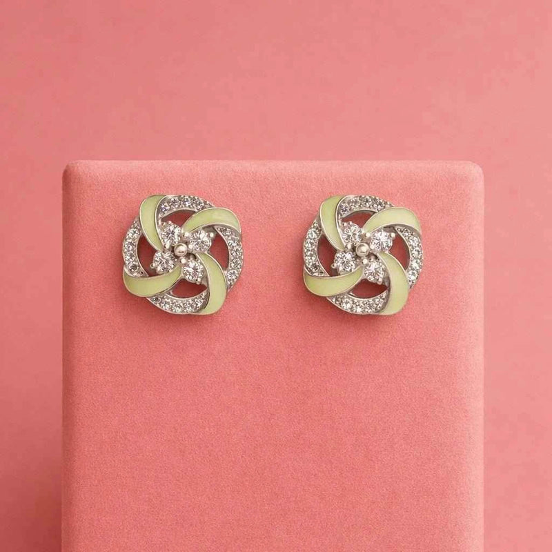 Mint green swirl pinwheel stud earrings in silver-tone with clear stone details