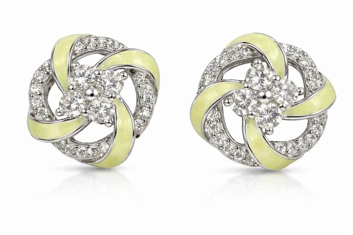 Silver-tone swirl pinwheel stud earrings with mint enamel and round clear center stones