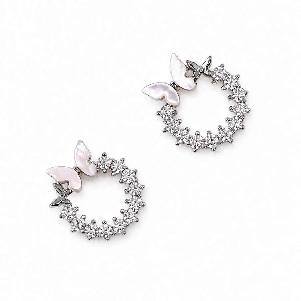 Silver-tone butterfly stud earrings with pavé halo hoop design, 925 finish
