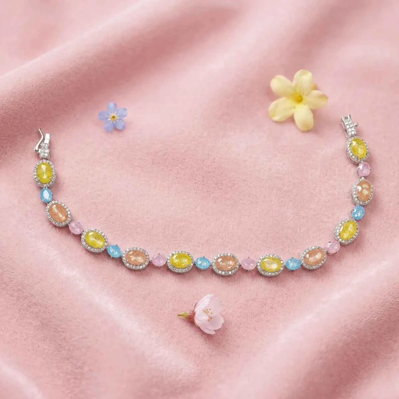 925 silver tennis bracelet with pastel oval halo stones in yellow, blue, pink