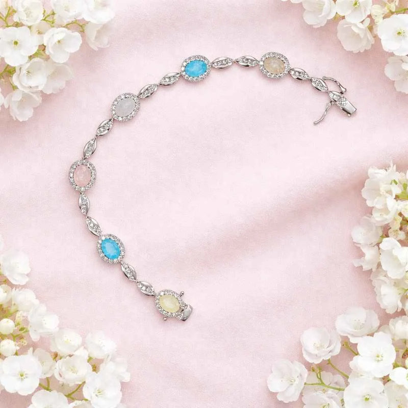 925 silver statement bracelet with oval halo stones, blue and pale pink accents