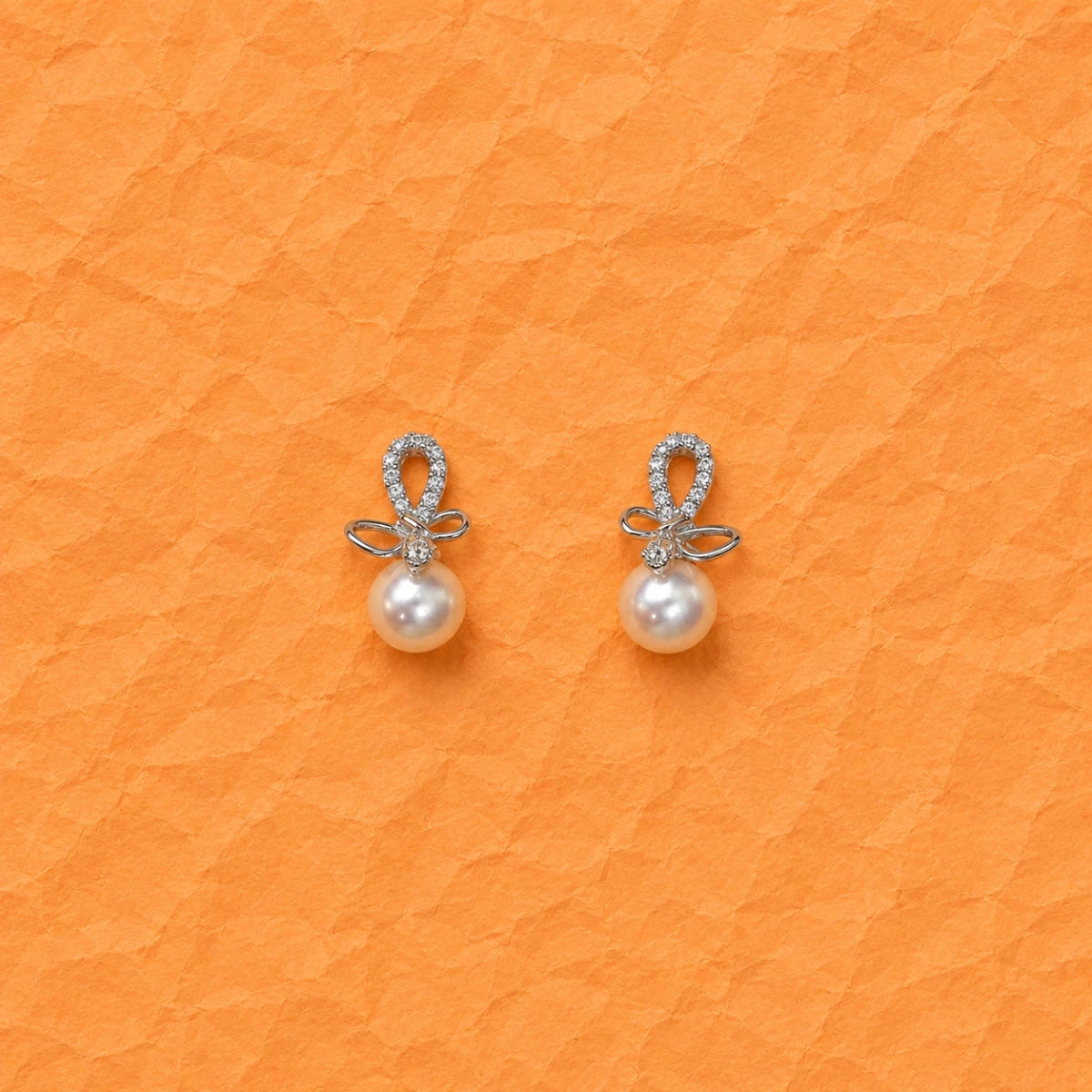 Pearl Bow Zirconia Drop Studs - Silvorn India