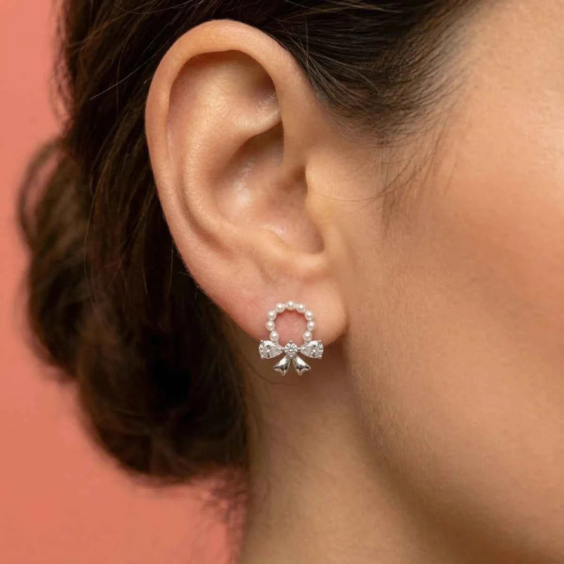 Pearl wreath ribbon bow stud earrings with pearl circle and crystal bow accents