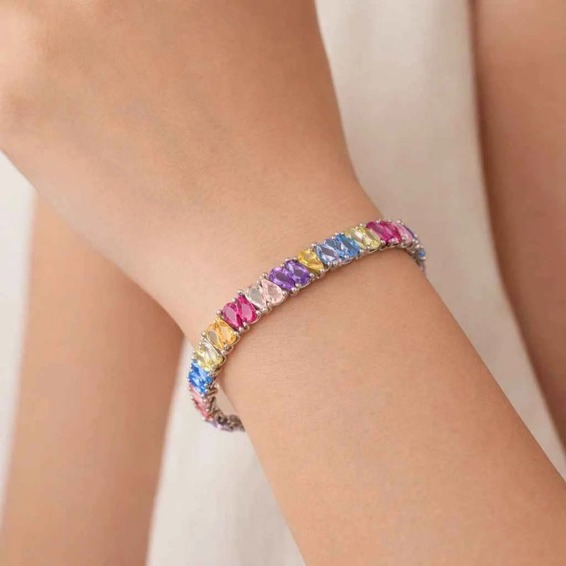 Rainbow pear-cut stone bracelet with multicolor sparkle on silver band, clasp