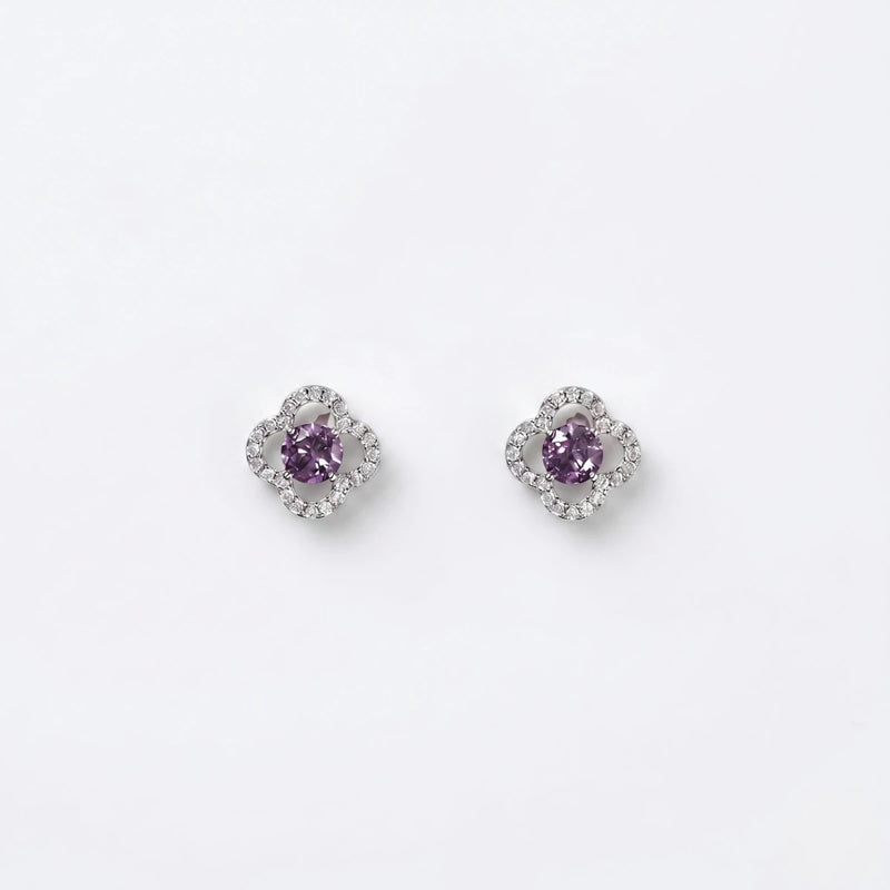 Purple crystal clover stud earrings in silver-tone, shown as a matching pair