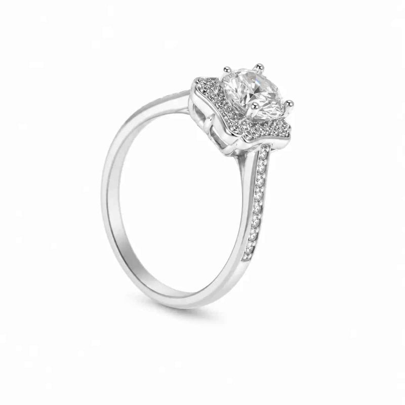 Sterling silver ring angled view with raised halo setting and pavé band