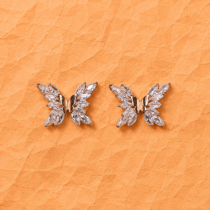Butterfly stud earrings: clear CZ stones with rose-gold center, silver posts