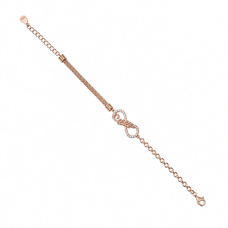 Rose gold eternal knot bracelet with linked chain and round knot charm, toggle end