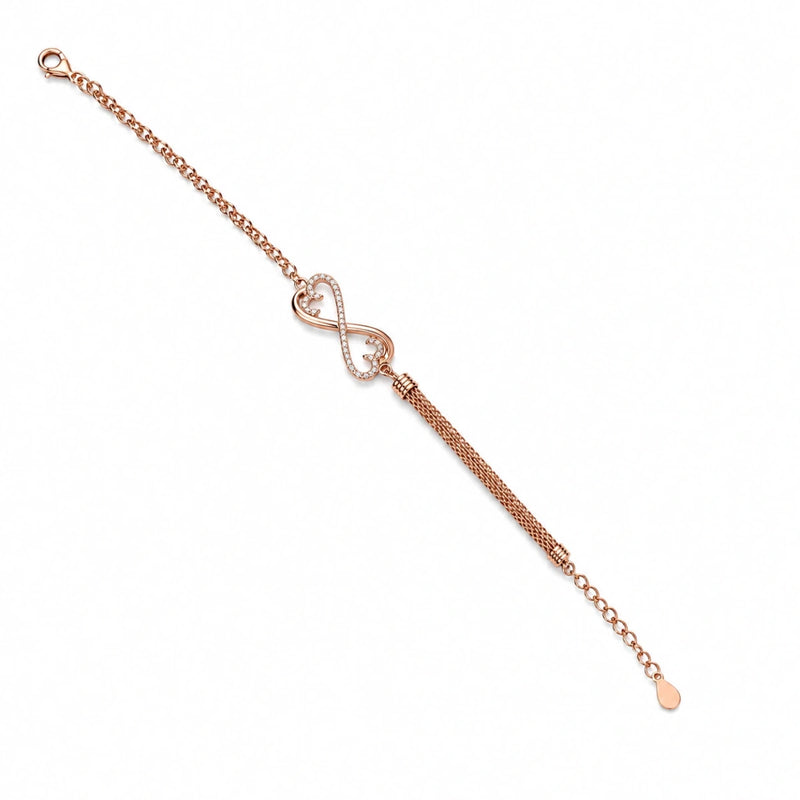 Rose gold infinity tassel bracelet with infinity link and hanging teardrop charm