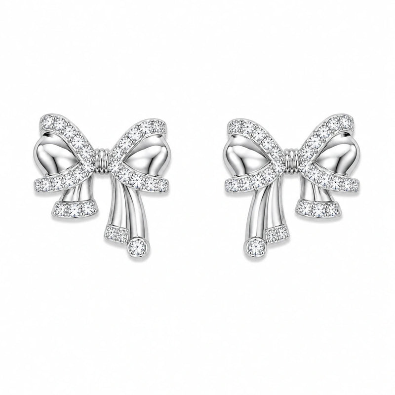 Crystal bow stud earrings in 925 silver, with dangling ribbon and small crystal drops